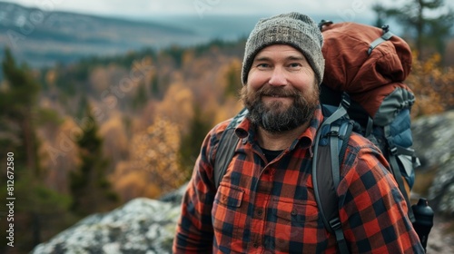 Portrait of a satisfied chubby man completing a challenging hike to a scenic viewpoint