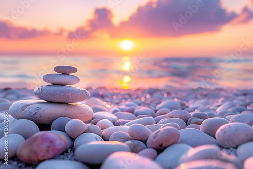 round stones on the seashore at sunset