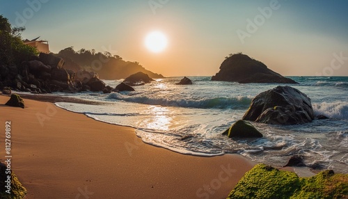 beautiful bright landscape waves and rocks on the beach amazing panorama sandy tropical beach with golden sun background
