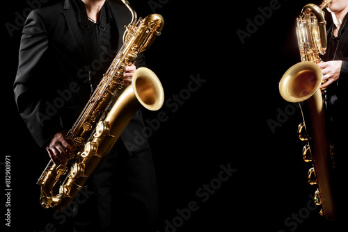 Saxophone player. Saxophonist jazz band playing baritone sax