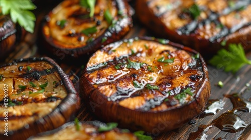 Grilled mushrooms next to fried eggplant.