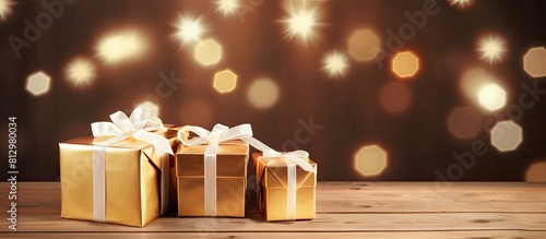 A copy space image displaying festive Christmas presents positioned on a rustic wooden surface