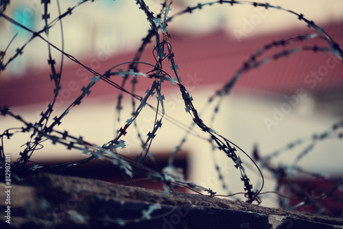 Barbed wire. Barbed wire on a fence as a background