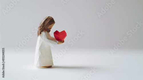 tilt-shift camera lens, side angle view od tiny cardboard handmade Jesus Christ offering a heart, on white background, space for copy text