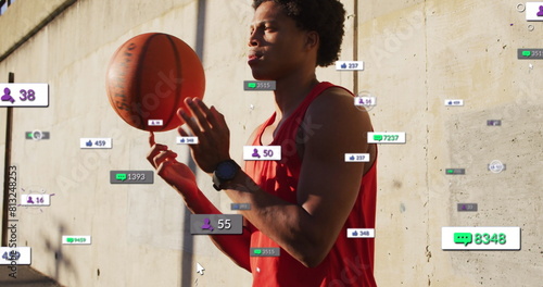 Image of multiple notification bars over biracial player spinning basketball on finger
