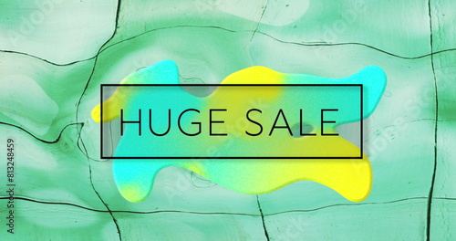 Image of huge sale text in black over yellow and blue globule on green liquid background