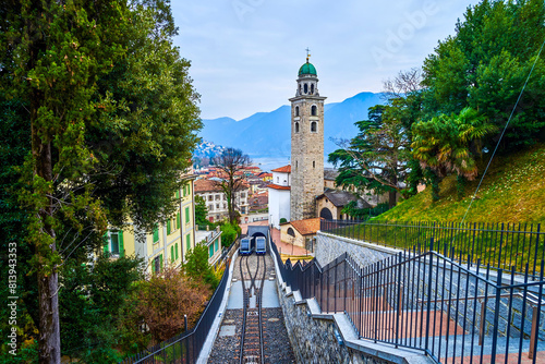 Sassellina funicular (Citta-Stazione funicular rides along San Lorenzo Cathedral, Lugano, Switzerland