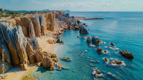 Aerial view of a coastal area known as Moon Valley with distinctive rock formations and turquoise sea waters.