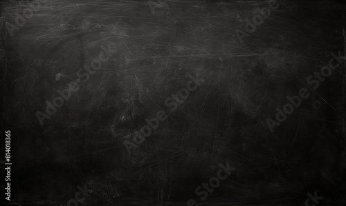 Textured blackboard surface with scratch marks, ideal for educational backgrounds, school-related designs. Realistic, black school board texture.