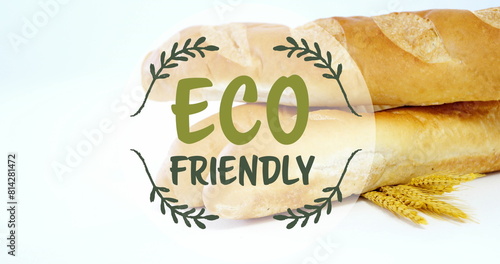 Image of eco friendly text banner against close up of fresh bread and wheat ears