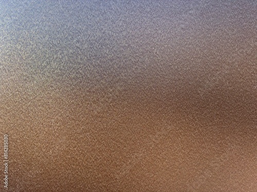 A detailed closeup of a brown painted steel surface, highlighting its smooth texture and subtle variations in tone, showcasing the craftsmanship and durability of the material.