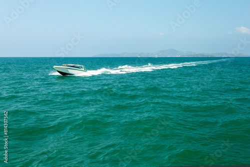  Speed boat on the sea near Pattaya city with natural beautiful background. Summer vacation in Thailand.