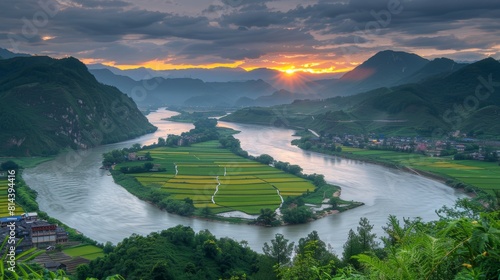 Scenic view of the himalayan mountains at sunrise with lush rice terraces and majestic river