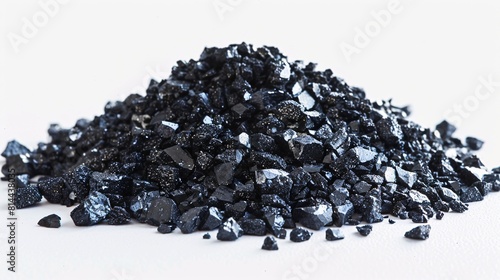 Heap of ebony quartz sand separated on a blank canvas; pulverized crystals are utilized in building supplies, purification processes, and farming.