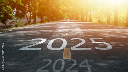 New year 2025 or straight concept. Text 2024, 2025, 2026 written on the road in the middle of the road. Planning concept. Goals. New year 2025 challenge.