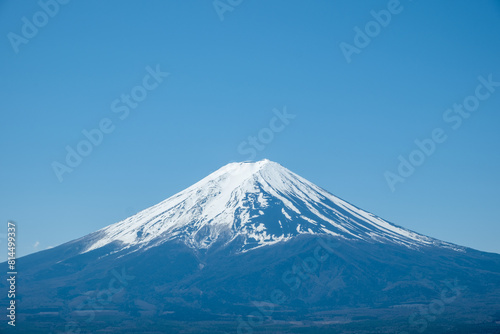 Fuji Mountain in Japan, snow capped peak in Spring, blue clear sky