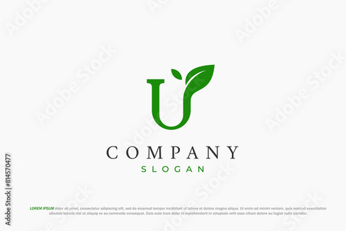 letter u and green leaf logo