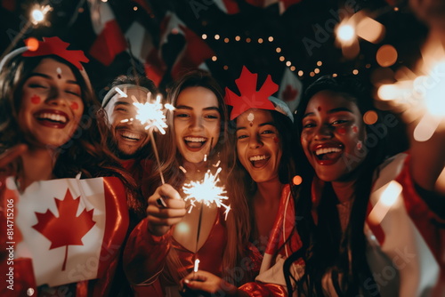 Diverse Friends Celebrating with Sparklers on Canada Day Night