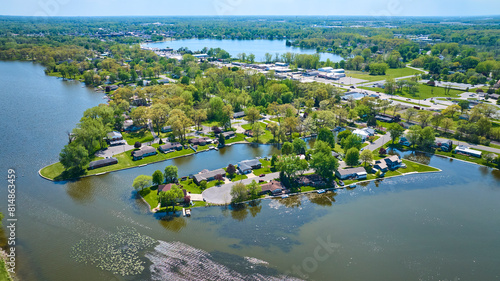 Aerial View of Serene Suburban Riverfront Homes in Warsaw, Indiana