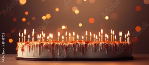 A festive birthday card with 13 burning candles on a beautiful background providing ample space for copying images