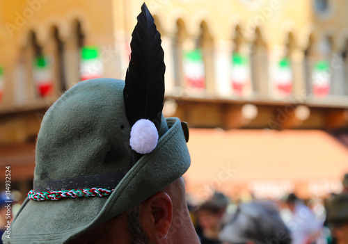 Black feather on the hat and Italian flag are the main Symbols of alpine Corps military called ALPINI