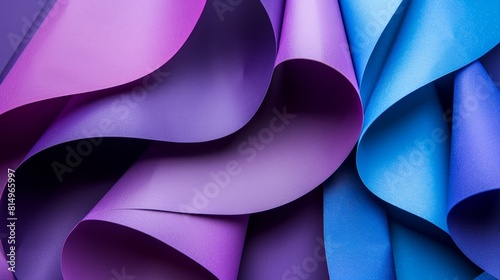  A detailed view of a wallpaper featuring purple and blue hues, showcasing a curved design on its left side