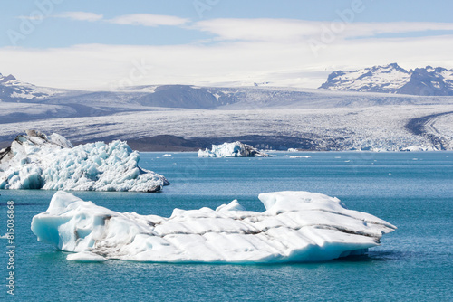 a stunning panoramic view over the unique breathtaking and iconic Jökulsárlón lagoon lake in iceland. With big icebergs on the water. 