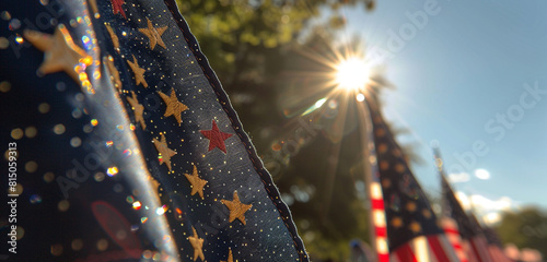 Close-up view of American flags with embroidered stars glowing in the bright midday sun at a Veterans Day parade.