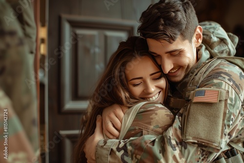 Soldier coming home from duty hugging his wife in front of the house