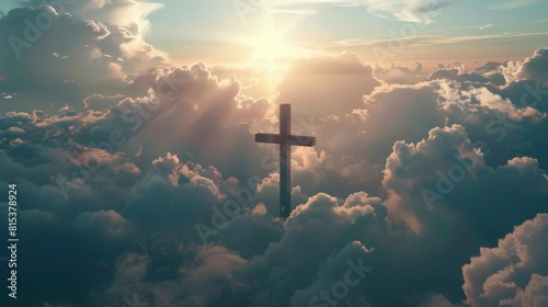 Cross symbolizing the sacrifice of Jesus Christ, set against a backdrop of clouds or heavenly light