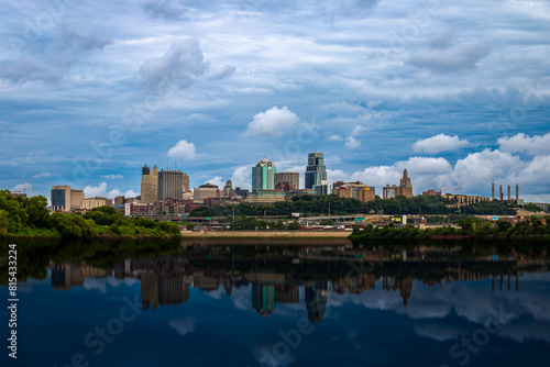 Kansas City Skyline with dramatic Sky and glass water reflection