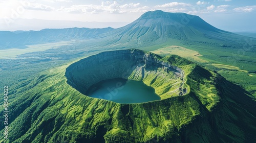 Aerial view of the Mount Aso in Japan, featuring its active volcanic crater, surrounding caldera, and lush green landscapes. 