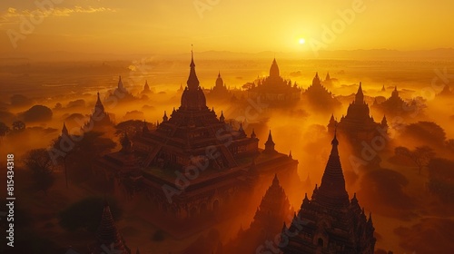 Aerial view of the Bagan Temples in Myanmar, with thousands of ancient pagodas and stupas spread across the vast plains at sunrise. 