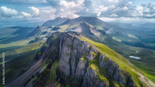 Aerial view of the Ben Nevis in Scotland, UK, showcasing the highest peak in the British Isles with its rugged terrain and surrounding highlands. 