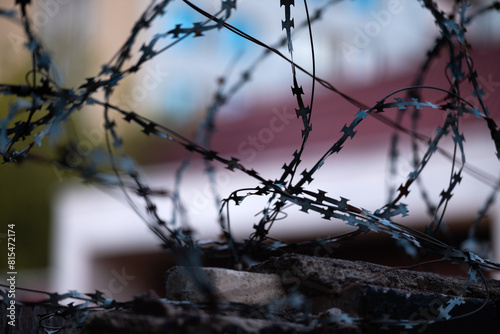 Barbed wire. Barbed wire on a fence as a background