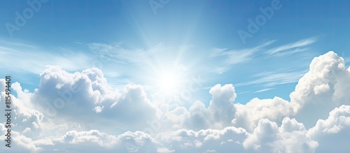 Overcast sky showcases a white cloud background with the sun Ample copy space image available