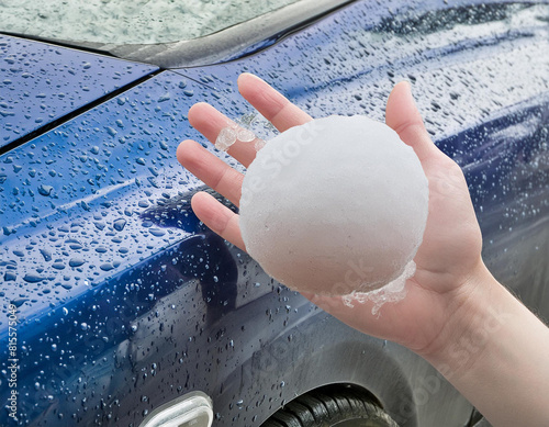 Modern car on a rainy day with hail