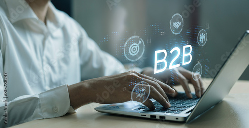 Business person navigates B2B landscape, harness technology to enhance business-to-business connections. Discover reshapes B2B interactions, driving innovation in business-to-businesses strategies