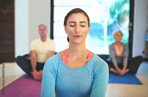 Female yoga instructor, elderly class and meditation in retirement center for health, relaxation and exercise. Woman, sitting and wellness in old age home for pensioners, pain relief and calm