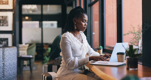 Woman, laptop and coffee shop or remote work as virtual fashion consultant, communication or email. Black person, typing and brainstorming research for online connection, engagement or social media