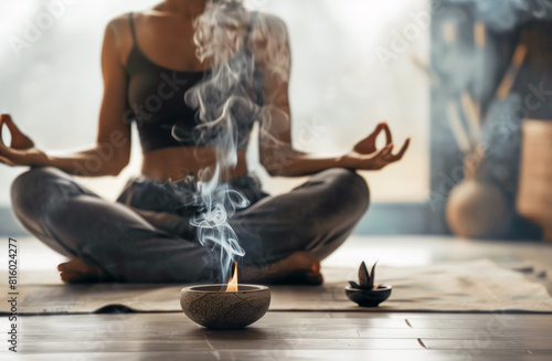 Woman Meditating with Incense in Peaceful Setting