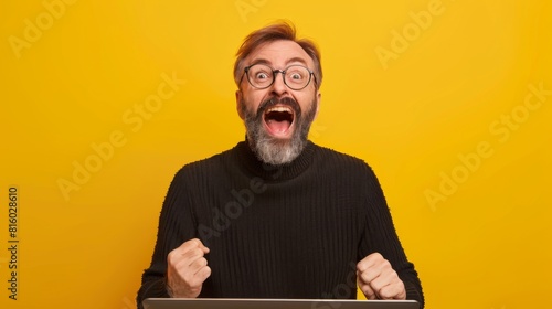 Excited Man with a Laptop