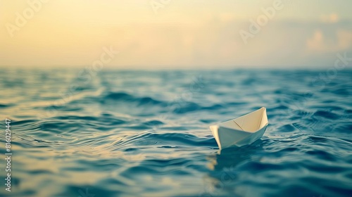 tiny paper boat adrift on the vast shimmering expanse of the ocean minimalist conceptual photography