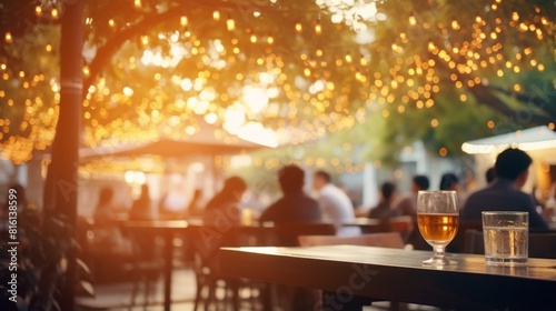 Golden sunlight cascades over an outdoor café, with drinks on a table and a relaxing atmosphere
