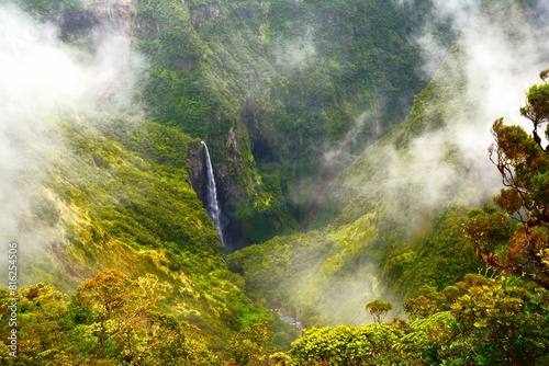 Waterfall into the Trou-de-Fer ("Iron Hole", up to 300 m deep canyon of the Bras de Caverne River on Reunion Island) as seen from the viewpoint high above