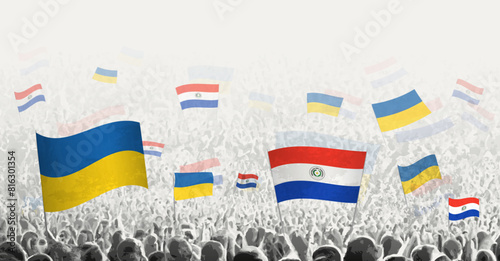 People waving flag of Paraguay and Ukraine, symbolizing Paraguay solidarity for Ukraine.