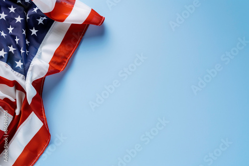 Powder blue background sets the ne an American flag honoring Memorial Day.