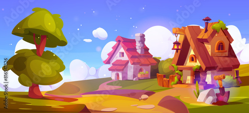 Fairytale village street on green summer landscape. Vector cartoon illustration of small gnome houses with chimneys, windows and lanterns, green lawn, old tree and green bushes, clouds in blue sky