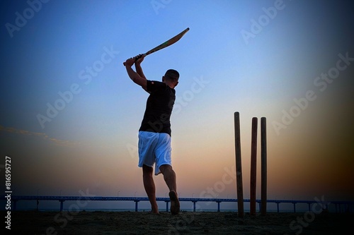 Silhouette of a person playing on the beach