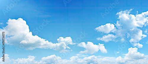 A serene and unobstructed scenery of a blue sky providing ample empty space for additional content